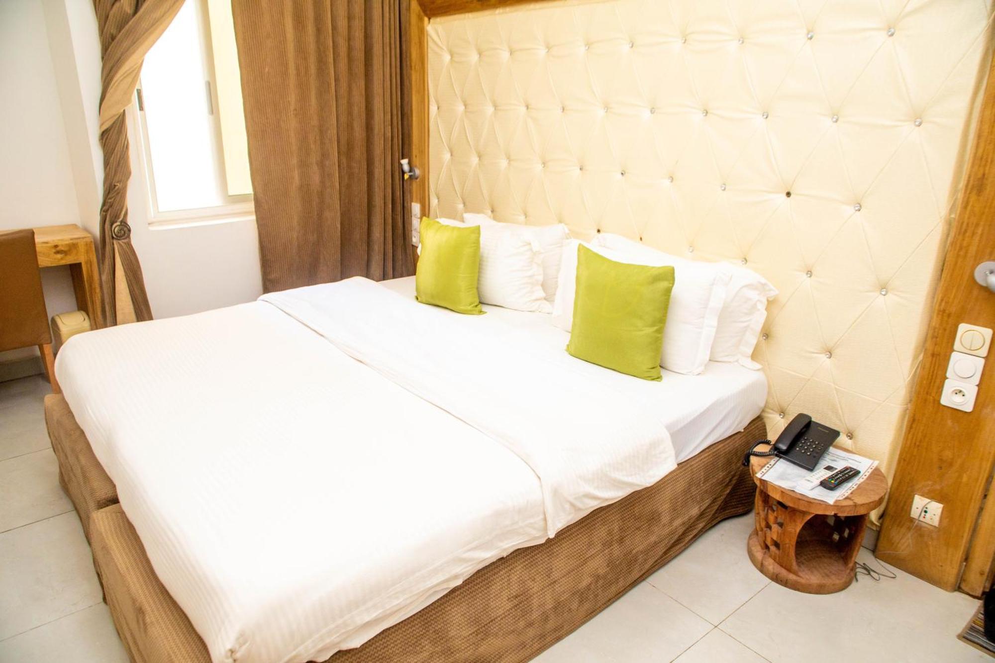 Hotel Les Orchidees Cotonou Zimmer foto